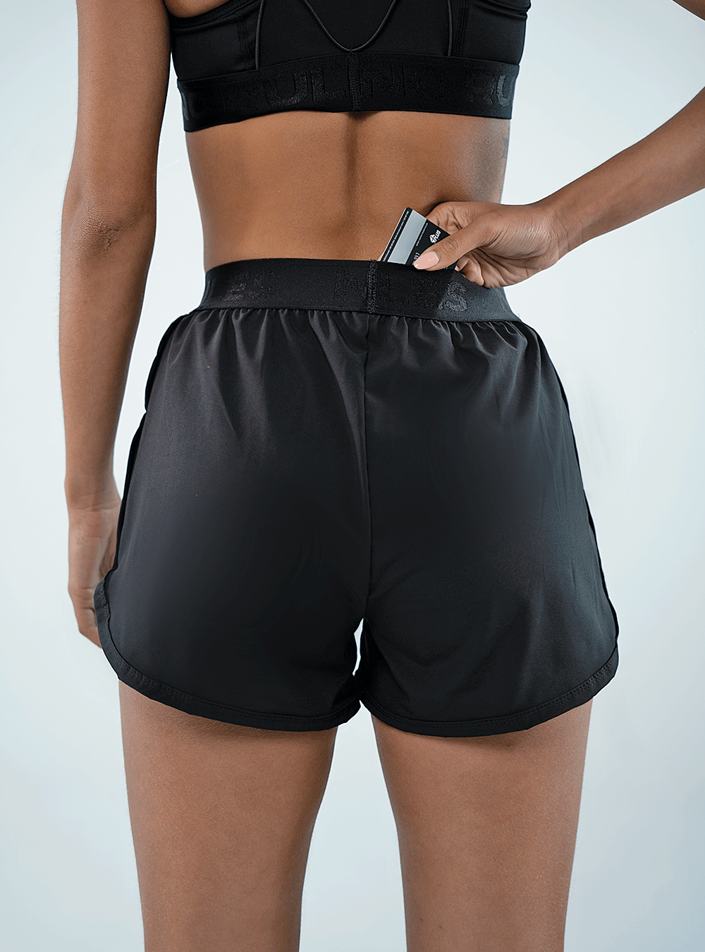 SHORT DE RUNNING DE LYCRA CON ELÁSTICO NEGRO