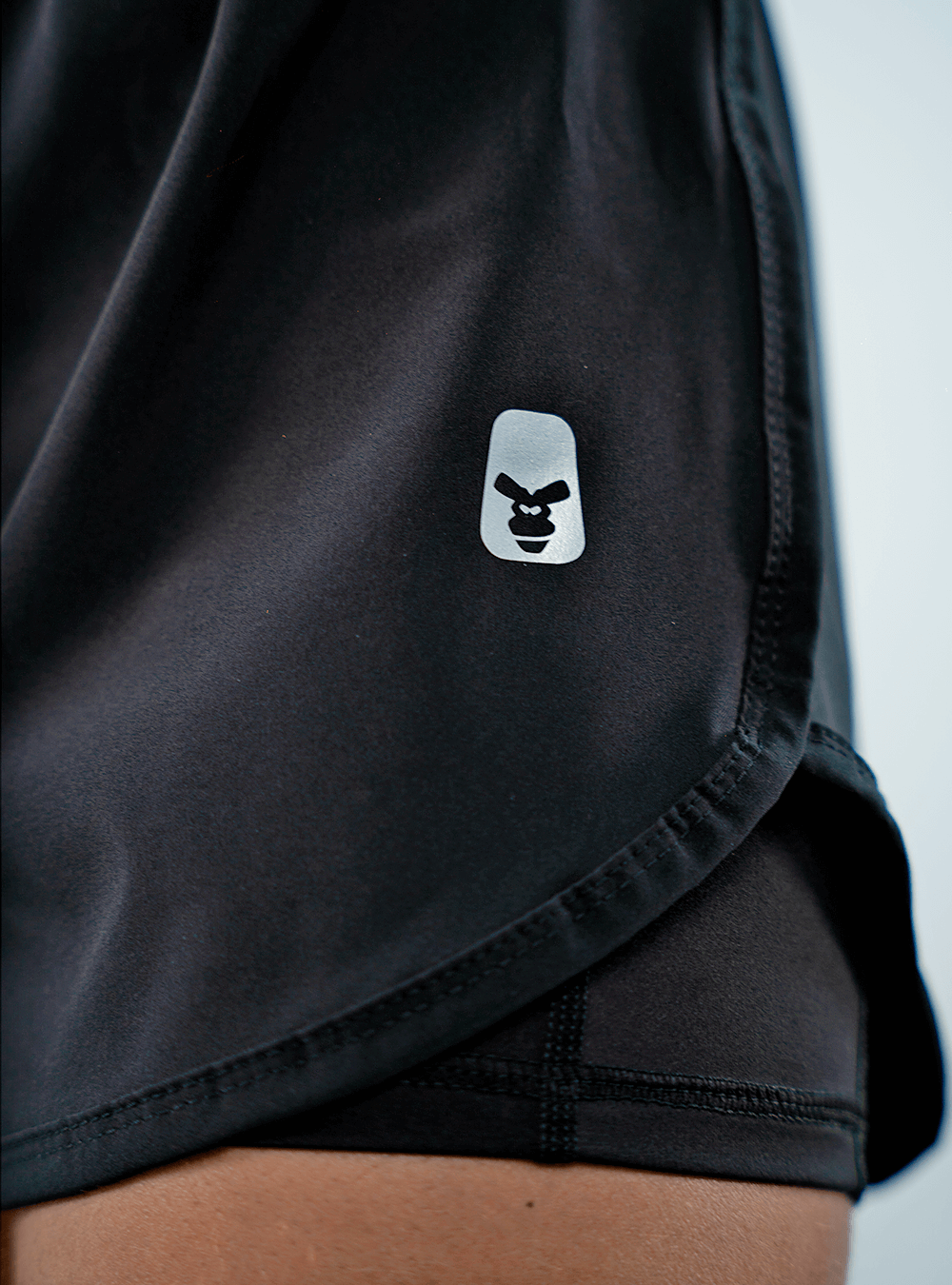 SHORT DE RUNNING DE LYCRA CON ELÁSTICO NEGRO